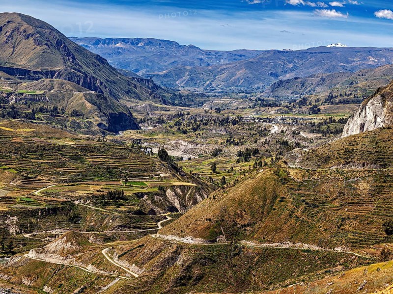 Mountainous scenery with river valley and terraced fields, the landscape of the Colca Canyon in the Aden of Peru