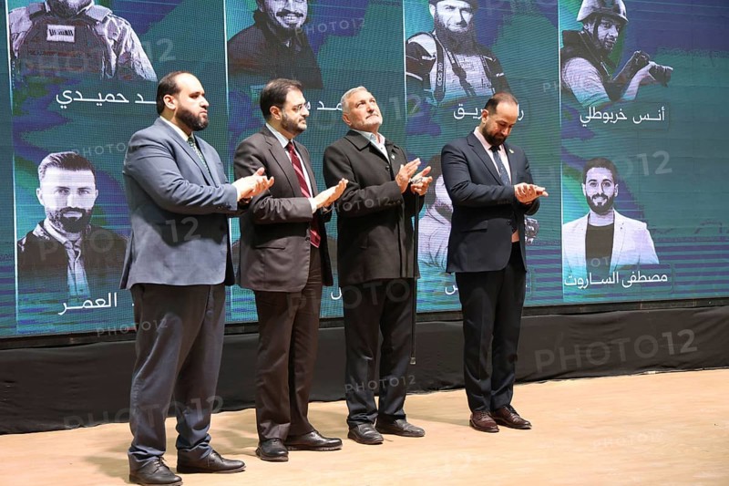 DAMASCUS, SYRIA - DECEMBER 6, 2025: Ministers and high-ranking officials of the newly formed Syrian government attend a symbolic ceremony to honor the families of victims who lost their lives during the Syrian war. The event, held in the capital Damascus, aims to provide social and symbolic recognition to the relatives of those fallen during the conflict as part of the country's transitional or commemorative phase, Damascus, Damascus, Syria
