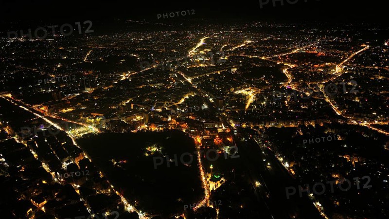 A Drone night view of Aleppo, Syria on December 19, 2025, showing illuminated streets, dense residential areas, and major traffic routes under the night sky, Aleppo, Aleppo, Syria
