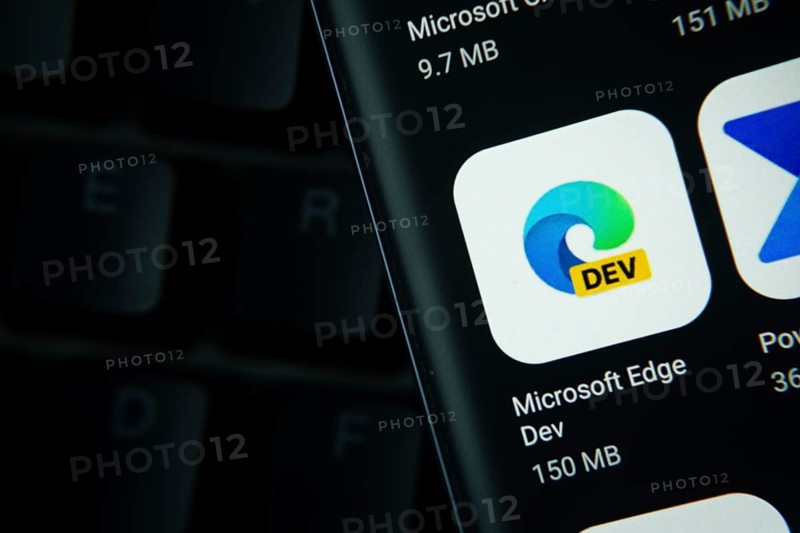 Dhaka, Bangladesh- 27 July 2025: Close-up of smartphone screen showing the Microsoft Edge Dev app icon with a dark interface