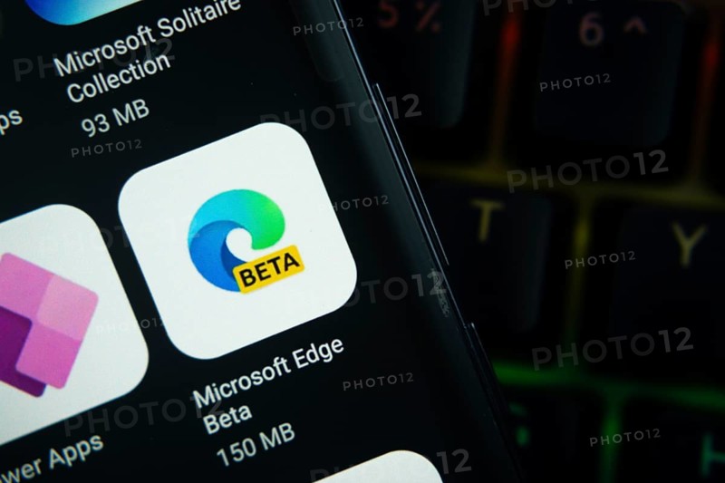 Dhaka, Bangladesh- 27 July 2025: Close-up of smartphone screen showing the Microsoft Edge Beta app icon with a dark interface