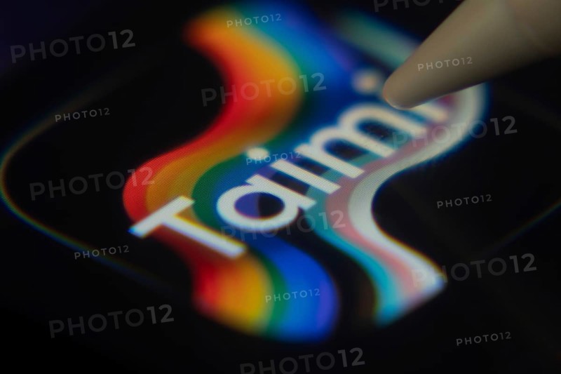 Dhaka, Bangladesh- 06 Dec 2025: Close-up of the Taimi app on a screen with a stylus pointing at it