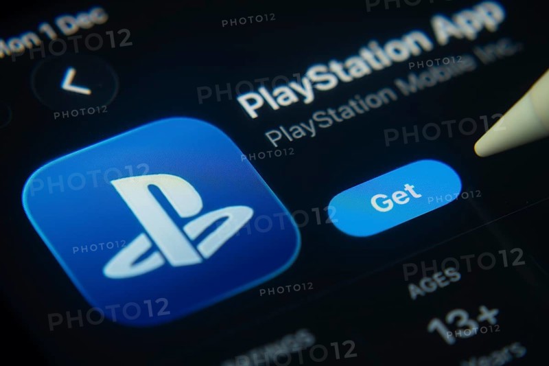 Dhaka, Bangladesh- 01 Dec 2025: A close-up of the PlayStation app icon in the App Store on an iPad screen