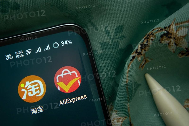Dhaka, Bangladesh- 07 May 2025: Taobao and AliExpress app icon is seen on smartphone