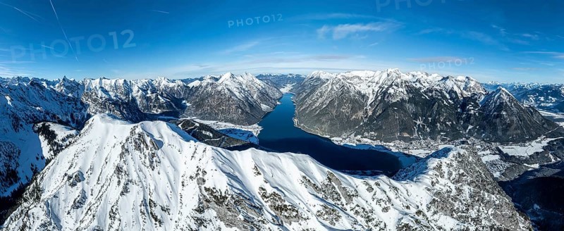 Aerial view, epic view of mountain landscape with snow in winter, summit of Bärenkopf, Achensee, Tyrol, Austria