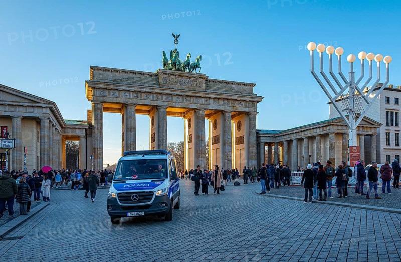 Large Hanukkah chandelier at the Brandenburg Gate in daylight, sign of lively Jewish life, symbolic power for 20 years, Berlin, Germany
