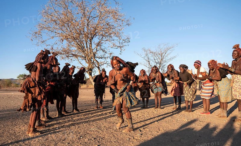 Himba woman dancing euphorically, traditional dance, traditional Himba village, Kaokoveld, Kunene, Namibia