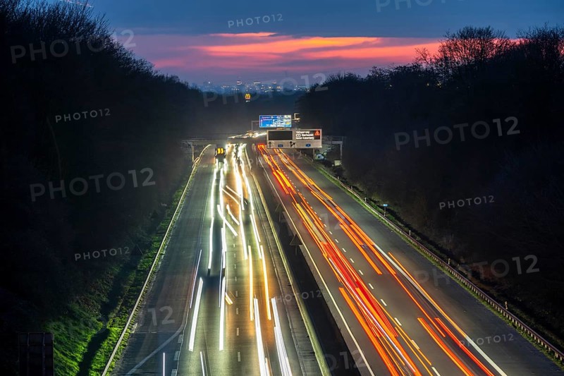 Evening traffic on the A52 motorway, between Düsseldorf and Essen, in front of the Breitscheid motorway junction, partly slow rush hour traffic, looking south, North Rhine-Westphalia, Germany