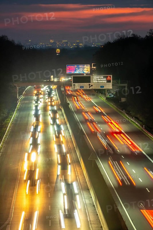 Evening traffic on the A52 motorway, between Düsseldorf and Essen, in front of the Breitscheid motorway junction, partly slow rush hour traffic, looking south, North Rhine-Westphalia, Germany