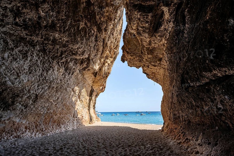 Rock cave on the beach at Cala Luna, Golfo di Orosei, Baunei, Sardinia, Italy