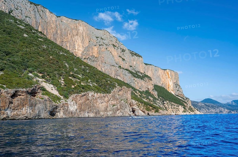 Picturesque rocky coast, cliffs and blue sea, Golfo di Orosei, Baunei, Sardinia, Italy