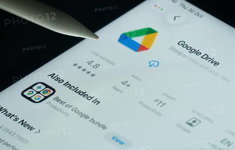 Dhaka, Bangladesh- 30 Oct 2025: Google Drive app on a iPad screen with a pen pointing at the install option