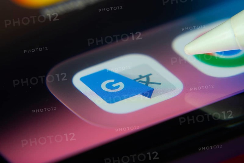 16 Nov 2025- Dhaka, Bangladesh: Stylus touching the Google Translate app icon on a smartphone screen