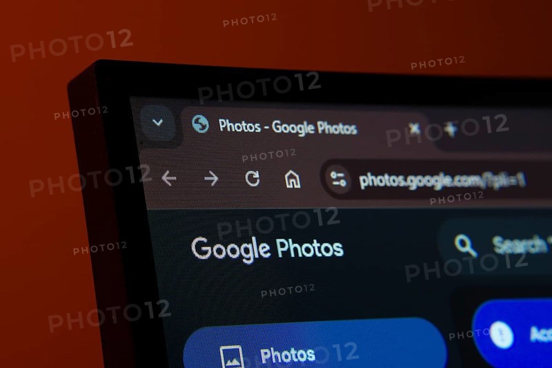 Dhaka, Bangladesh- 02 June 2025: Close-up of a computer screen displaying the Google Photos web interface in dark mode