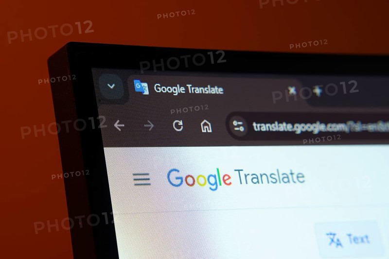 Dhaka, Bangladesh- 02 June 2025: Close-up of a computer screen displaying the Google Translate web interface in dark mode