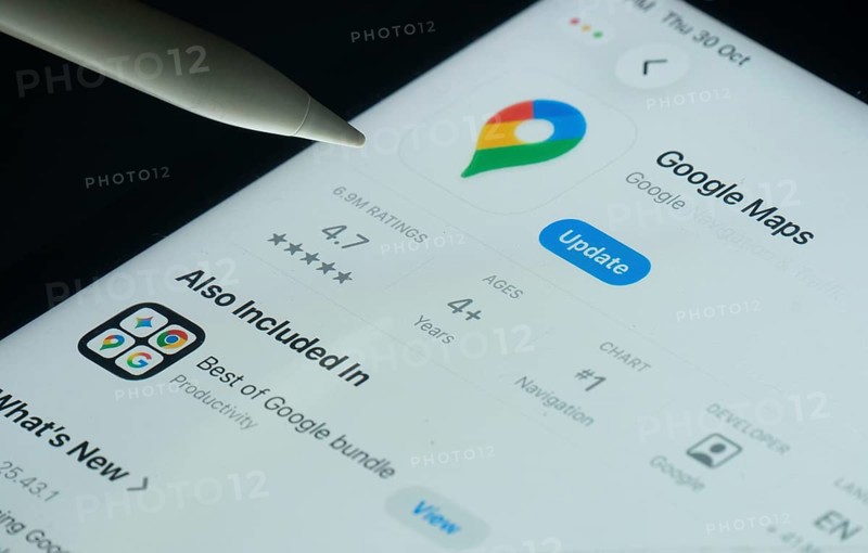 Dhaka, Bangladesh- 30 Oct 2025: Google maps app on a iPad screen with a pen pointing at the install option