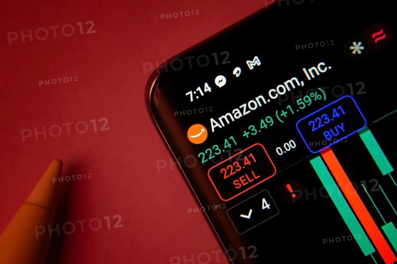Dhaka, Bangladesh- 08 Sep 2025: Close-up of a phone screen showing Amazon.com, Inc stock market data with a candlestick chart