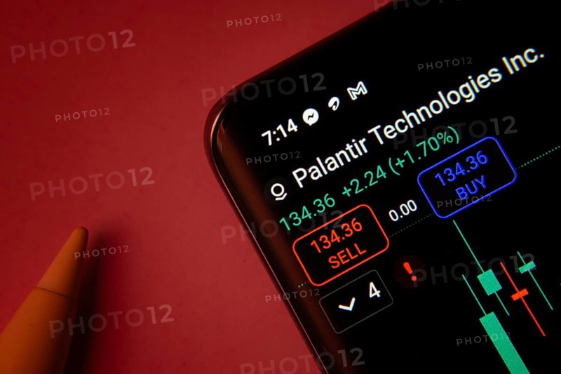 Dhaka, Bangladesh- 08 Sep 2025: Close-up of a phone screen showing Palantir Technologies Inc stock market data with a candlestick chart