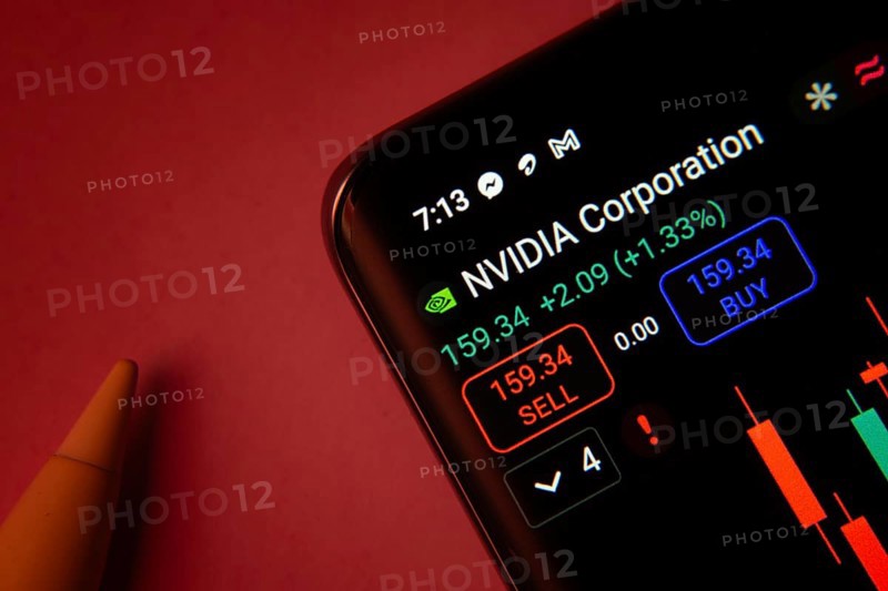 Dhaka, Bangladesh- 08 Sep 2025: Close-up of a phone screen showing Nvidia Corporation stock market data with a candlestick chart