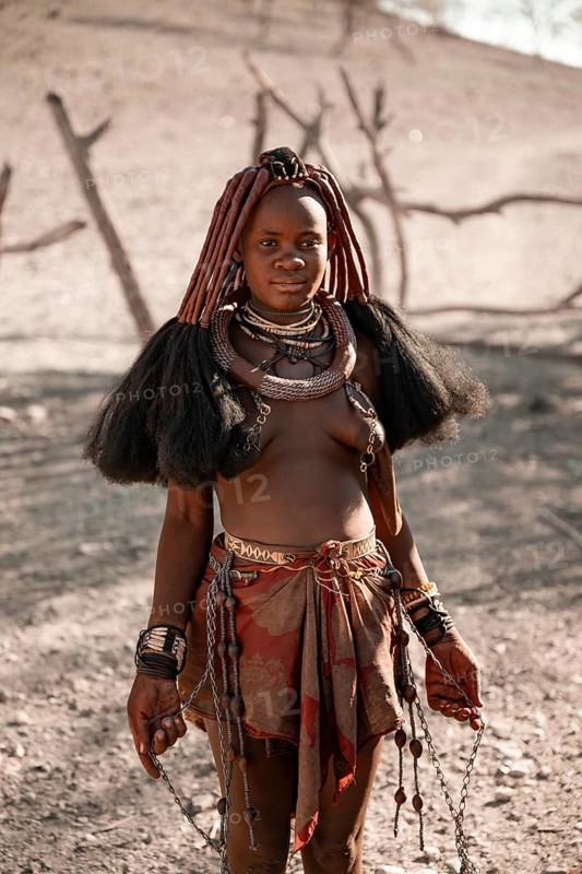 Young woman, Himba woman, traditional Himba village, Kaokoveld, Kunene, Namibia