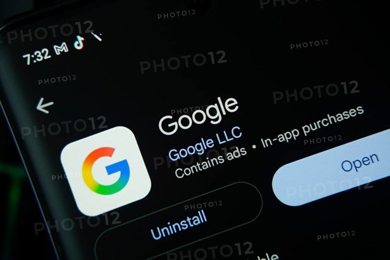 Dhaka, Bangladesh- 27 July 2025: Screen displaying Google app with open and uninstall options, dark interface