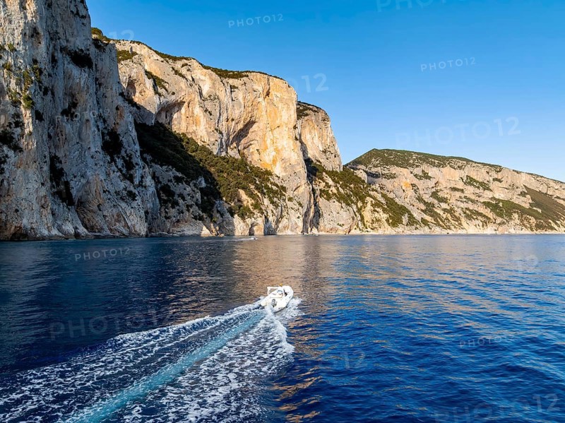 Motorboat rides on picturesque rocky coast ImmorgenLicht, cliffs, Golfo di Orosei, Baunei, Sardinia, Italy