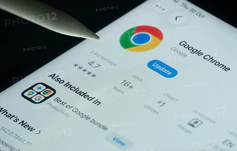 Dhaka, Bangladesh- 30 Oct 2025: Google Chrome app on a iPad screen with a pen pointing at the install option