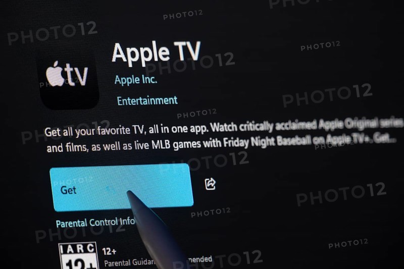 Dhaka, Bangladesh- 19 Sep 2025: A close-up of the Apple TV app from the Microsoft Store is shown on a laptop screen