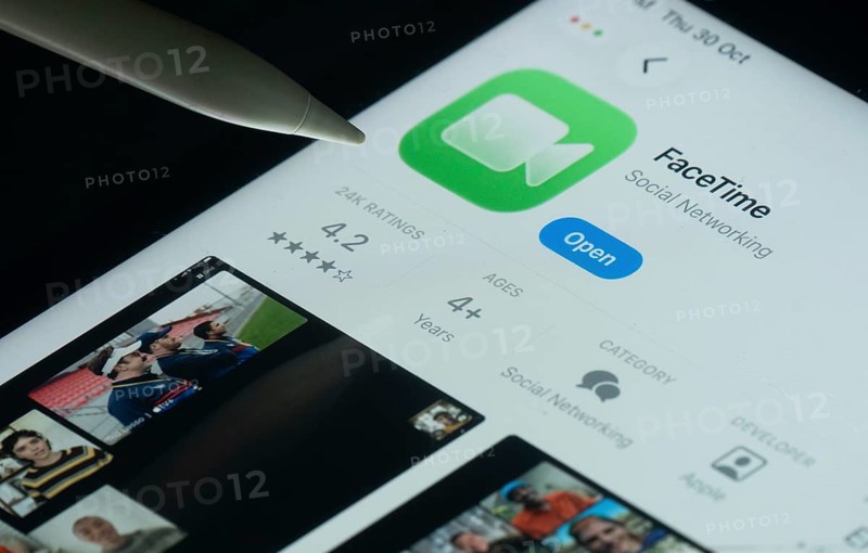 Dhaka, Bangladesh- 30 Oct 2025: Apple Facetime app on a iPad screen with a pen pointing at the install option