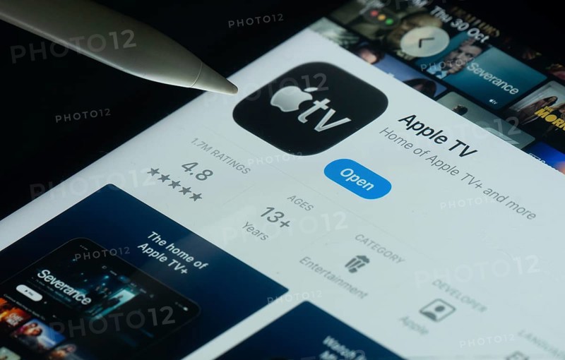 Dhaka, Bangladesh- 30 Oct 2025: Apple TV app on a iPad screen with a pen pointing at the install option