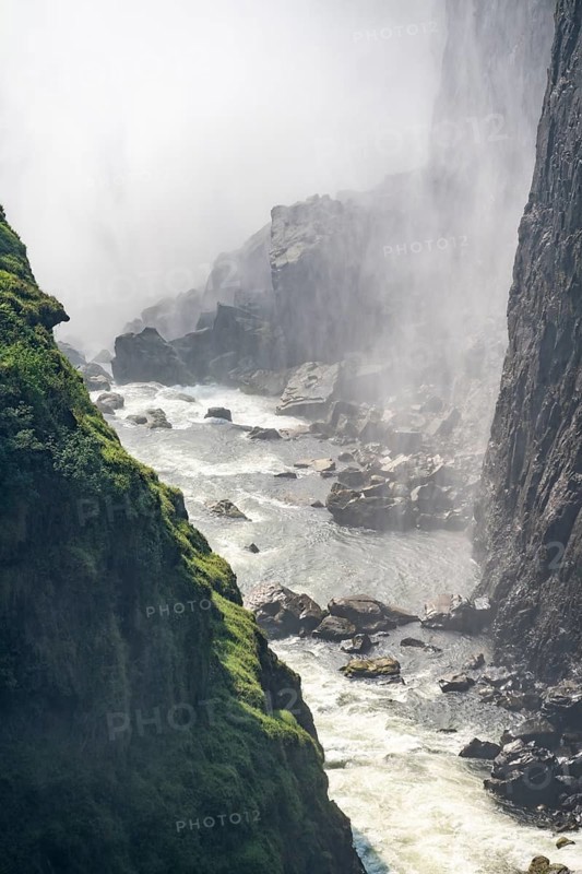 Water plunges into the depths, Victoria Falls with gorge, Zambezi, Zimbabwe