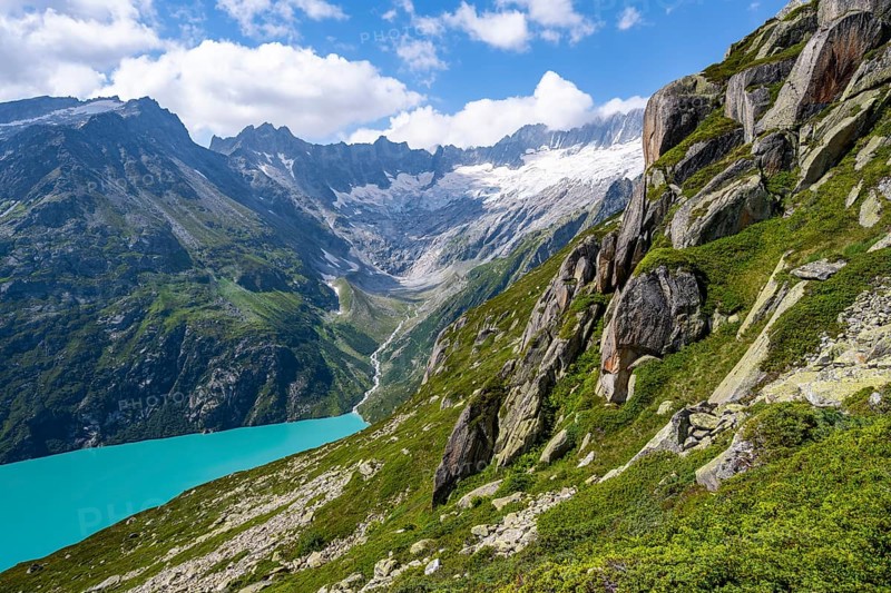 Turquoise blue mountain lake Göscheneralpsee, picturesque mountain landscape with dammastock and damma glacier, Göscheneralp, Canton of Uri, Switzerland