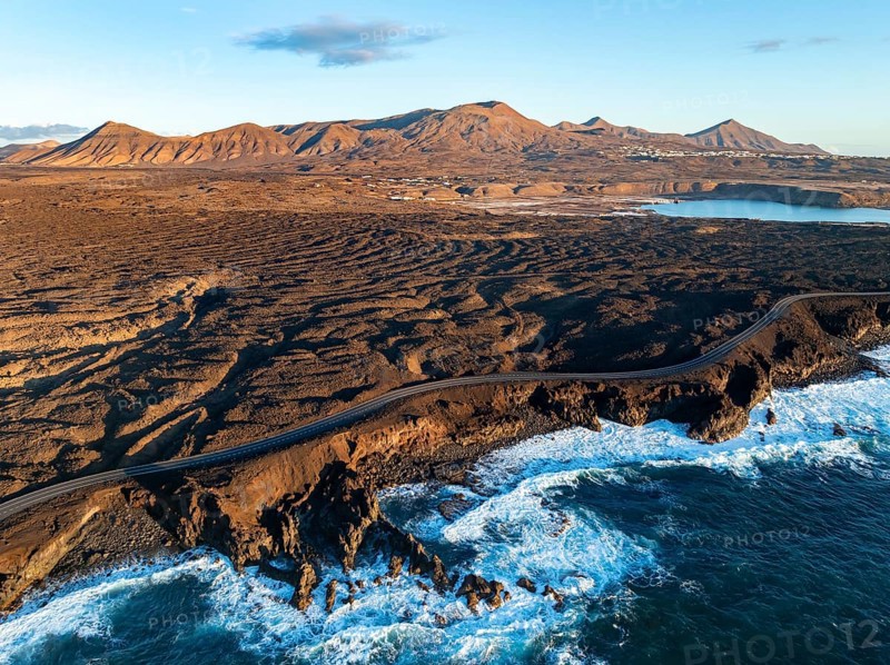 Coast with lava fields, volcanic landscape near Los Hervideros, in the evening light, aerial view, Lanzarote, Canary Islands, Spain