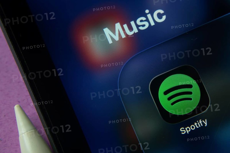 16 Nov 2025- Dhaka, Bangladesh: Close-up of Spotify app icons on a iPad screen