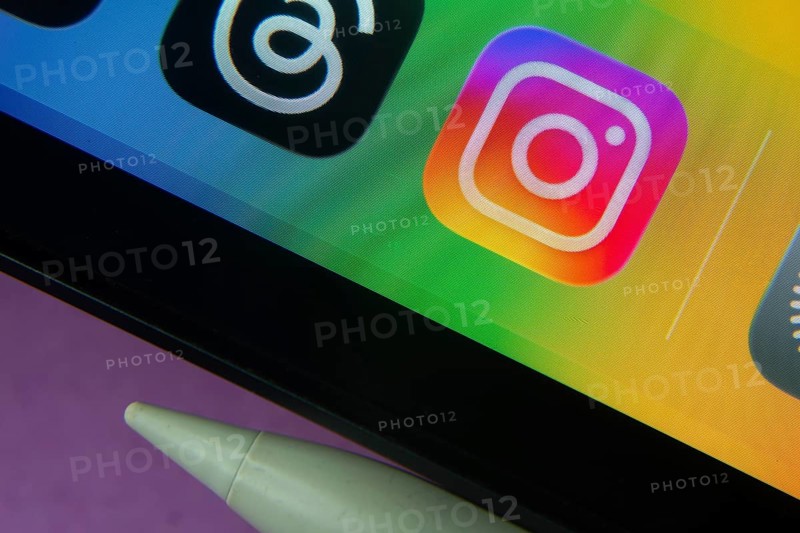 16 Nov 2025- Dhaka, Bangladesh: Instagram and other app icons with a digital pen on a iPad screen