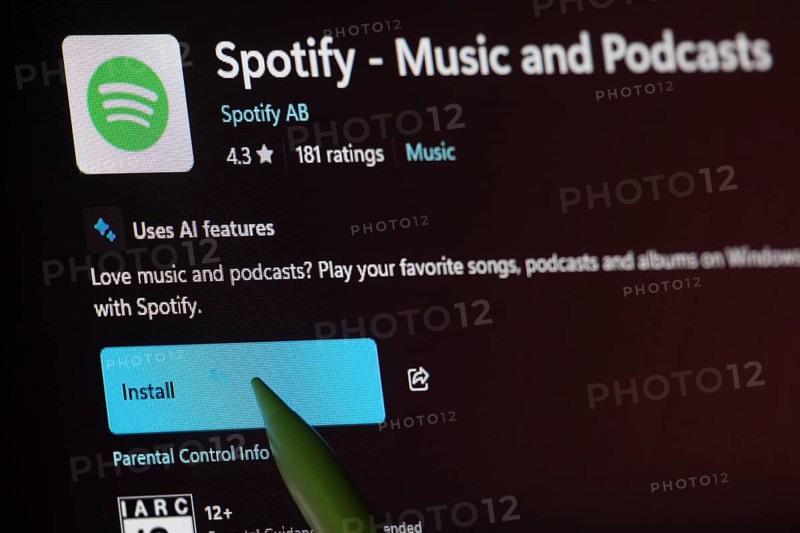Dhaka, Bangladesh- 19 Sep 2025: A close-up of the Spotify app from the Microsoft Store is shown on a laptop screen