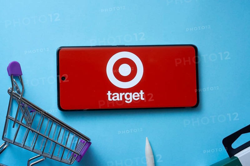 Dhaka, Bangladesh- 03 July 2025: Smartphone displaying Target logo with shopping cart on a blue background