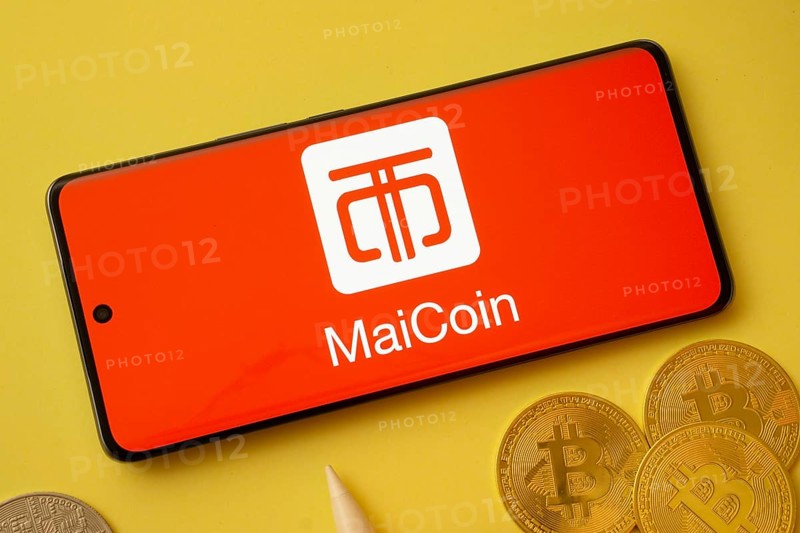 Dhaka, Bangladesh - 04 April 2025: The logo of MaiCoin is displayed on a smartphone screen