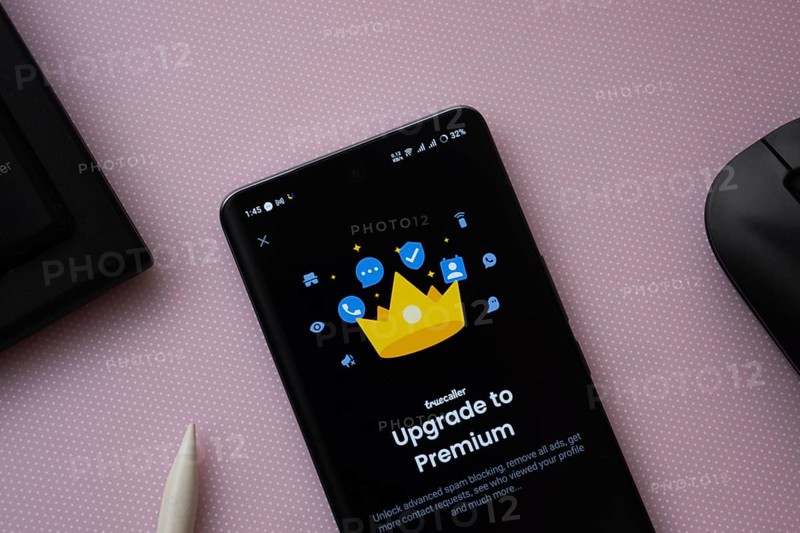 Dhaka, bangladesh- 16 March 2025: A smartphone screen featuring the upgrade to premium Truecaller