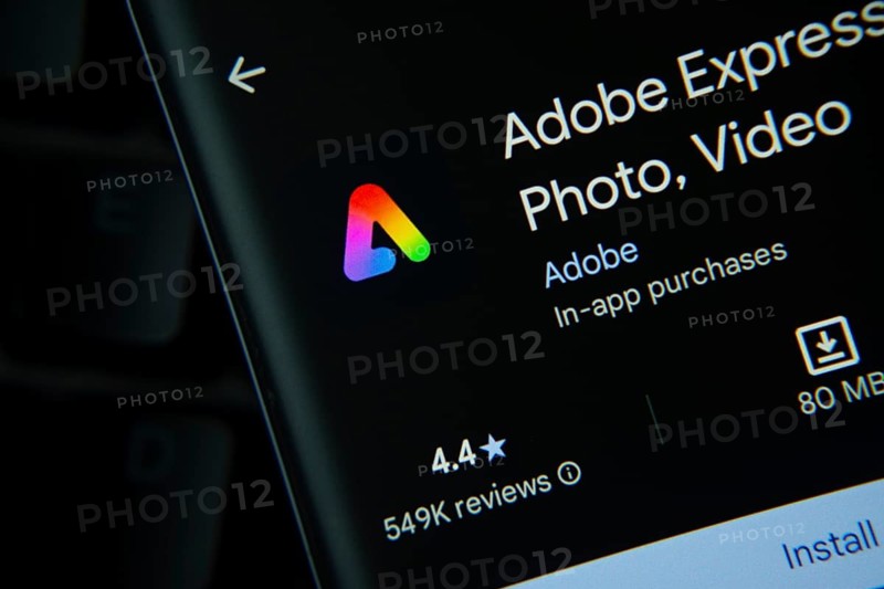 Dhaka, Bangladesh- 27 July 2025: Adobe Express app from Google Playstore is displayed on a smartphone screen