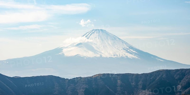 Snow-covered summit of Mount Fuji volcano in spring, Owakudani, Hakone, Japan