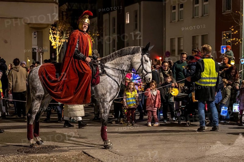 Martinszug in Essen-Rüttenscheid, the parish of St. Lambertus, Saint Martin actor on a horse, with over 500 participants, North Rhine-Westphalia, Germany