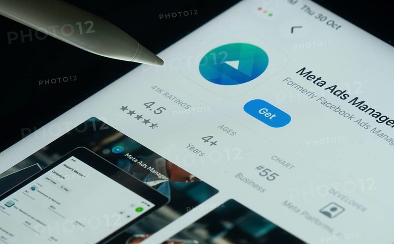 Dhaka, Bangladesh- 30 Oct 2025: meta ads manager app on a iPad screen with a pen pointing at the install option