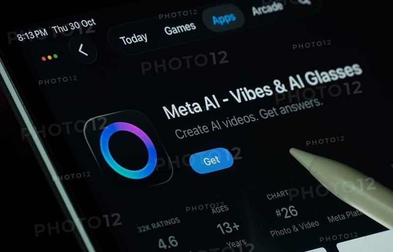 Dhaka, Bangladesh- 30 Oct 2025: Meta Ai app displayed on a iPad screen in dark mode with a digital pen pointing at it
