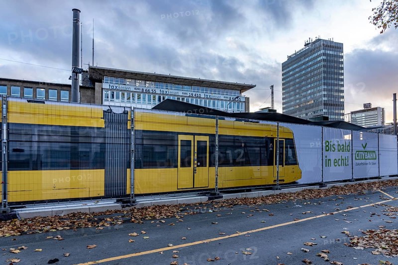 Construction site of the stop at the main train station, for the new city railway, visualization of the full-size tram, a new tram line over 5 km long, which will connect the west of Essen, the new district 51, with the city center, from 2026, Essen, North Rhine-Westphalia, Germany