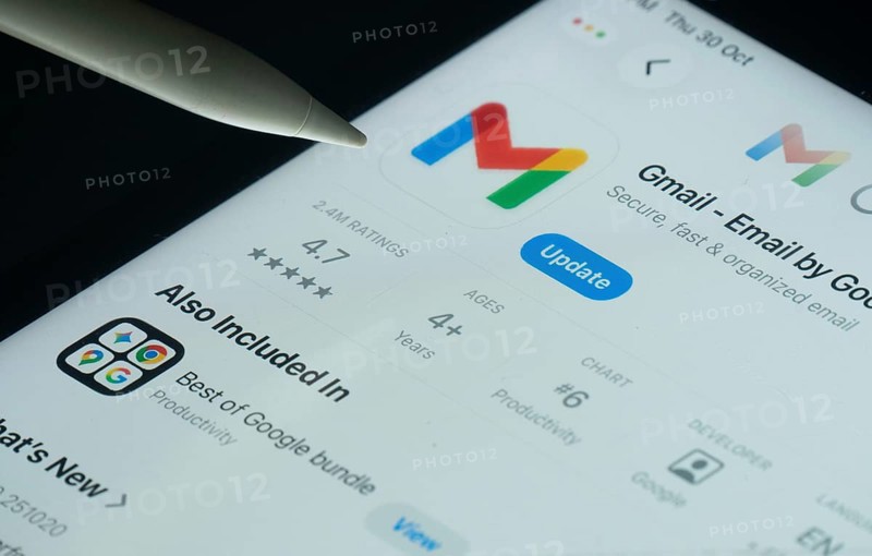 Dhaka, Bangladesh- 30 Oct 2025: Gmail app on a iPad screen with a pen pointing at the install option