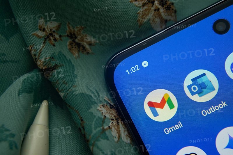 Dhaka, Bangladesh- 07 May 2025: Gmail and Outlook app icon is seen on smartphone