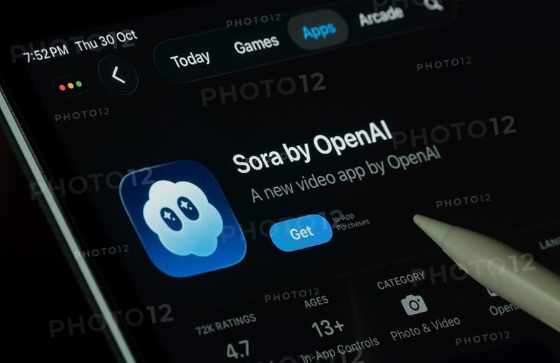 Dhaka, Bangladesh- 30 Oct 2025: Sora Ai app displayed on a iPad screen in dark mode with a digital pen pointing at it