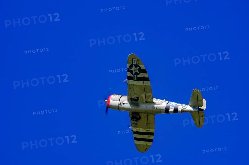 An RC model of a Republic P-47 Thunderbolt during a demonstration as part of an air show at the Fliegerbergfest of the Rossfeld Luftsportverein in Metzingen-Glems, Baden-Württemberg, Germany, for editorial use only