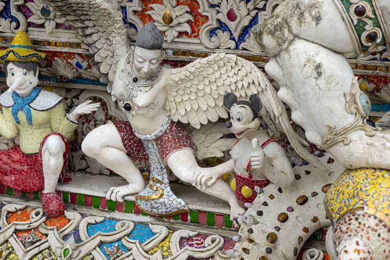 Decorative elements with pop culture references (for example comics, superheroes) in the stucco and porcelain vases outside and inside the art hall with modern art trends such as minimalism and abstraction, Wat Pariwat, Yan Nawa district, Bangkok, Thailand